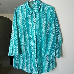 Turquoise and white quarter length sleeves blouse.